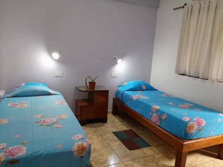 Residencial Santiago Habitaciones Hotel Bed & Break Fast โปซาดัส ภายนอก รูปภาพ